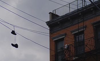 Building With Shoes on Electrical Lines